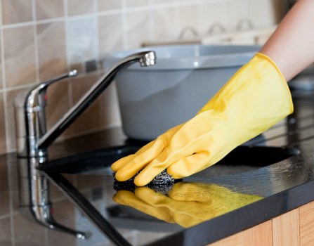 Professional house cleaning in a bright living room
